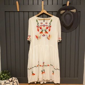 Anthropologie dress with embroidery. Size medium.
